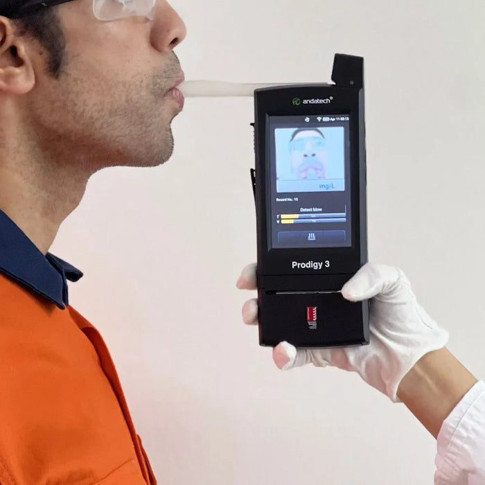 Safety officer being tested with Andatech Prodigy workplace breathalyser
