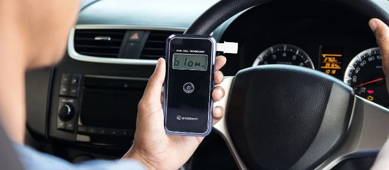 Andatech AlcoSense Stealth personal breathalyser in the car