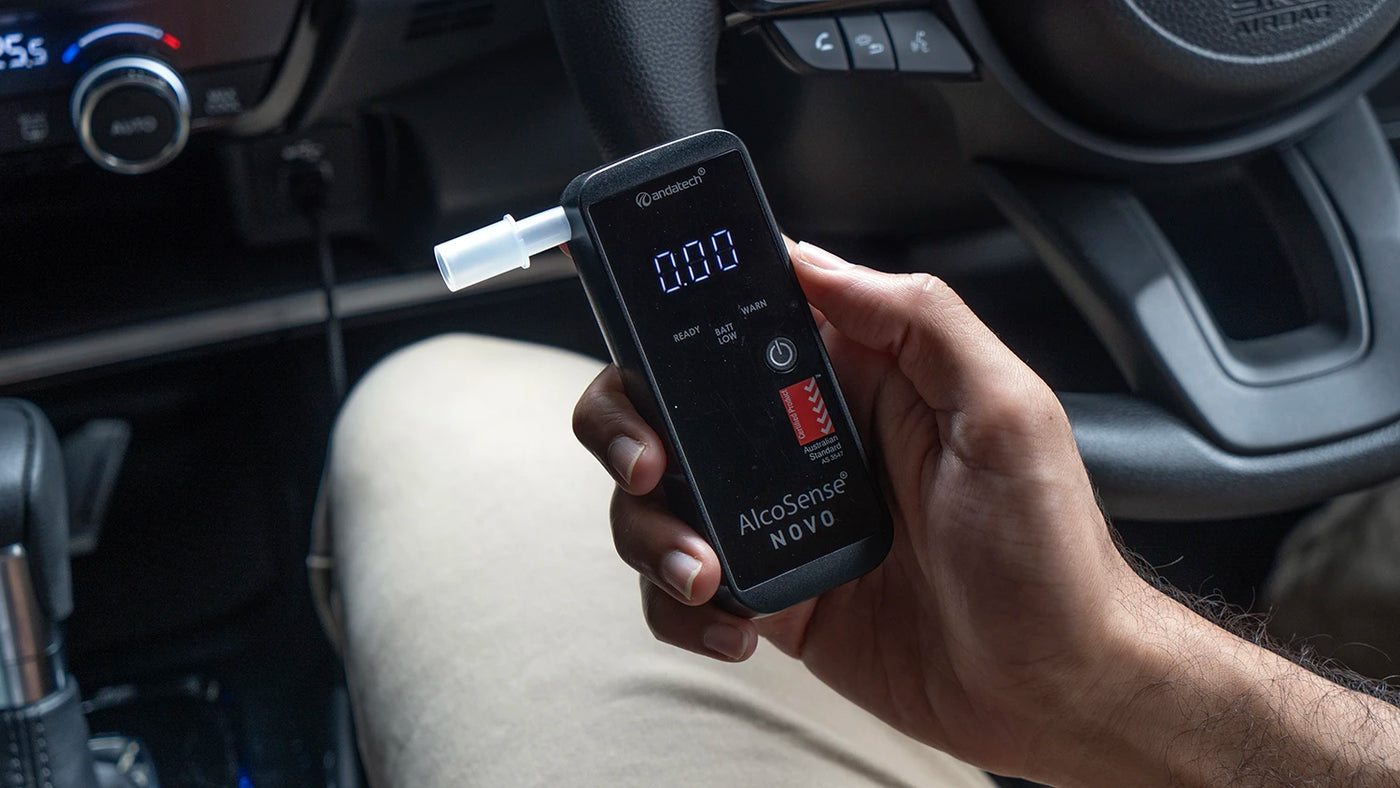 alcosense_novo_personal_breathalyser_in_car