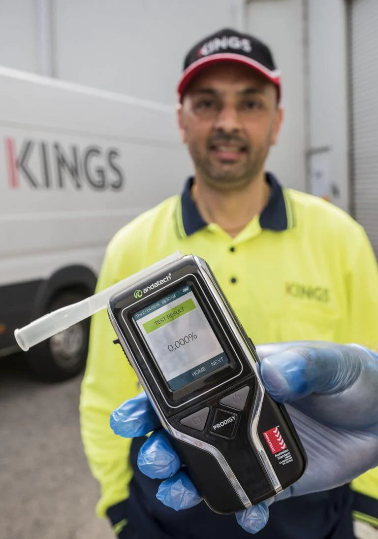 Kings tests driver with the Andatech Prodigy S handheld breathalyser